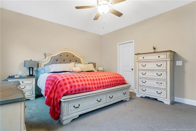 bedroom featuring ceiling fan, carpet, and baseboards