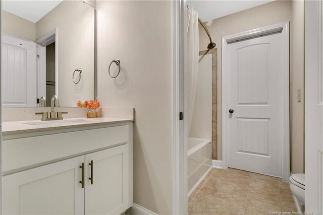 full bath with toilet, tile patterned floors, shower / bath combo with shower curtain, and vanity