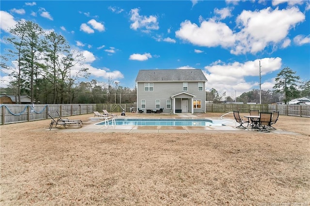 view of pool with a patio area, fence, and a fenced in pool