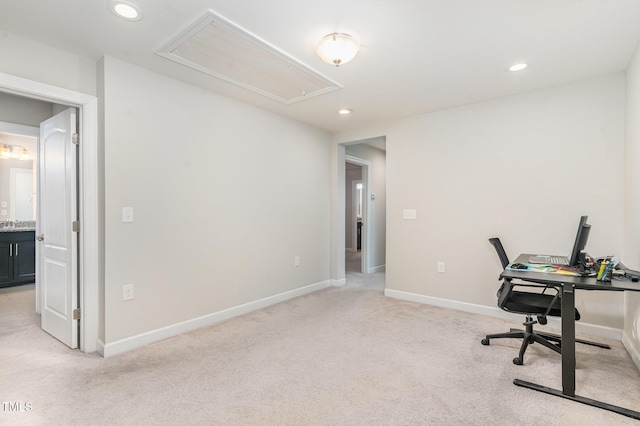 office area with baseboards, recessed lighting, attic access, and light colored carpet