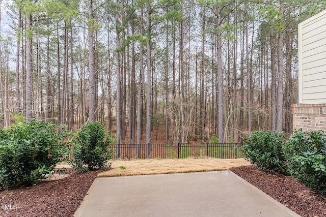 view of patio / terrace featuring fence