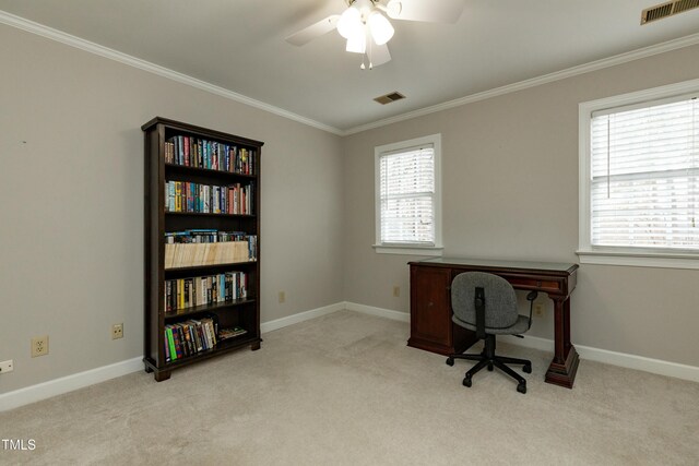 office space featuring visible vents, carpet floors, baseboards, and crown molding