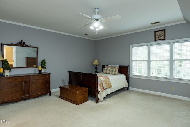 bedroom with visible vents, baseboards, light colored carpet, and crown molding