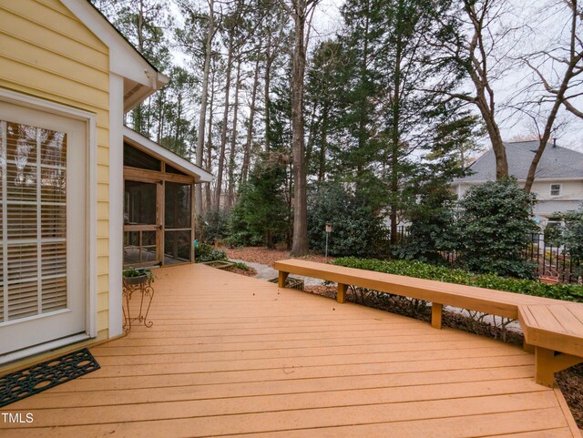 deck featuring a sunroom