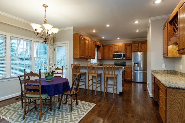 dining room featuring a chandelier, recessed lighting, crown molding, and dark wood-style flooring