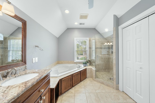 full bath with vanity, lofted ceiling, a stall shower, visible vents, and a bath