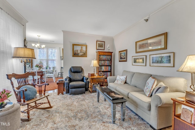 carpeted living area featuring ornamental molding and an inviting chandelier