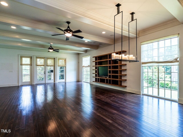 unfurnished living room featuring wood-type flooring, a ceiling fan, baseboards, beam ceiling, and crown molding