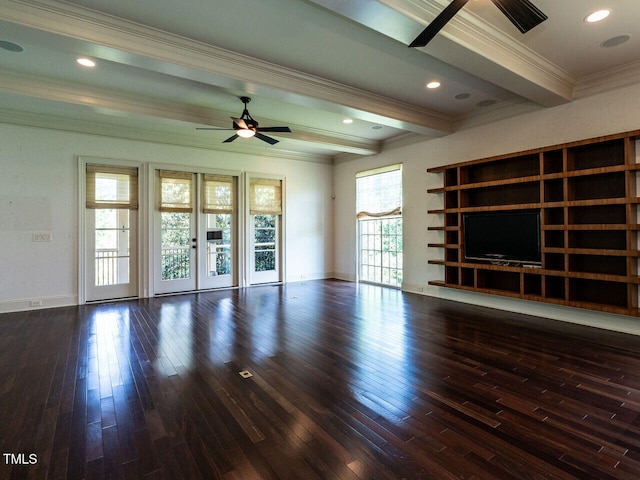 unfurnished living room featuring a ceiling fan, dark wood finished floors, beam ceiling, ornamental molding, and baseboards