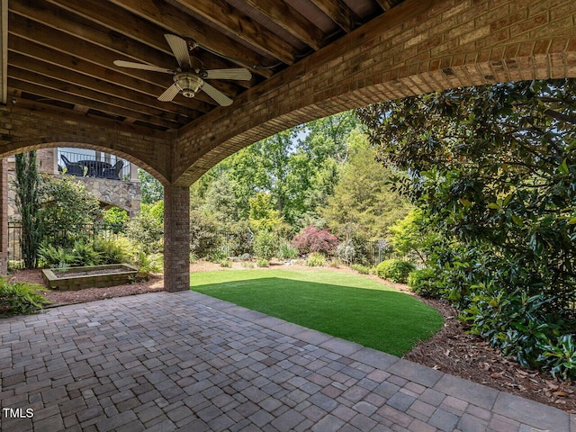 view of patio / terrace with a ceiling fan