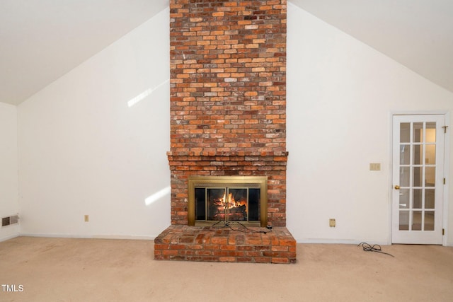 unfurnished living room with high vaulted ceiling, carpet flooring, a fireplace, and baseboards