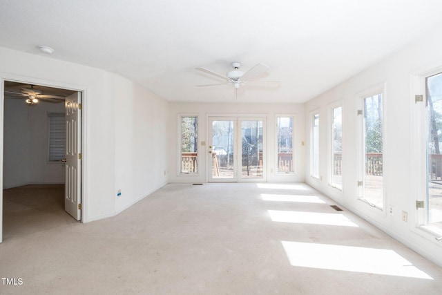 interior space featuring a ceiling fan