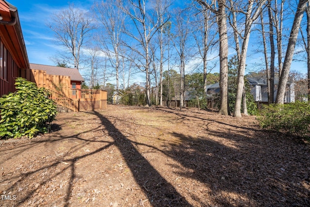 view of yard with a deck