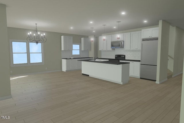 kitchen with stainless steel microwave, backsplash, dark countertops, and built in refrigerator