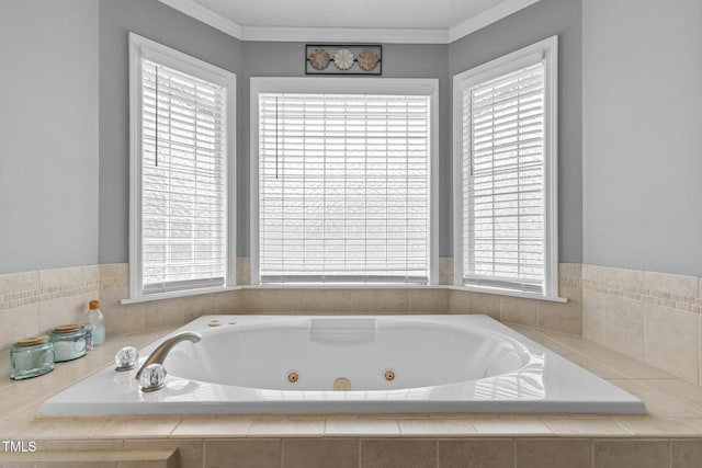 full bath featuring a jetted tub and crown molding