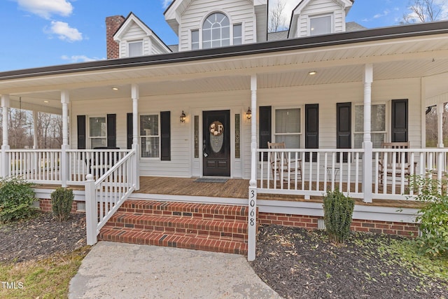 view of front of home featuring covered porch