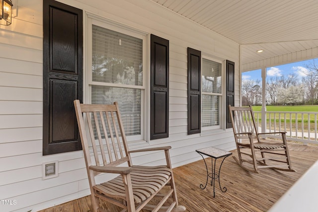 deck featuring covered porch