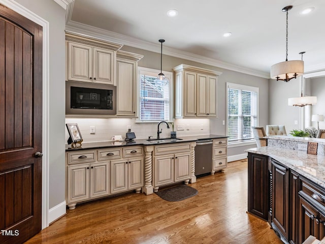 309 Shoreline Dr, Princeton, NC 27569 - kitchen featuring cream cabinetry, light wood-style flooring, a sink, black microwave, and crown molding