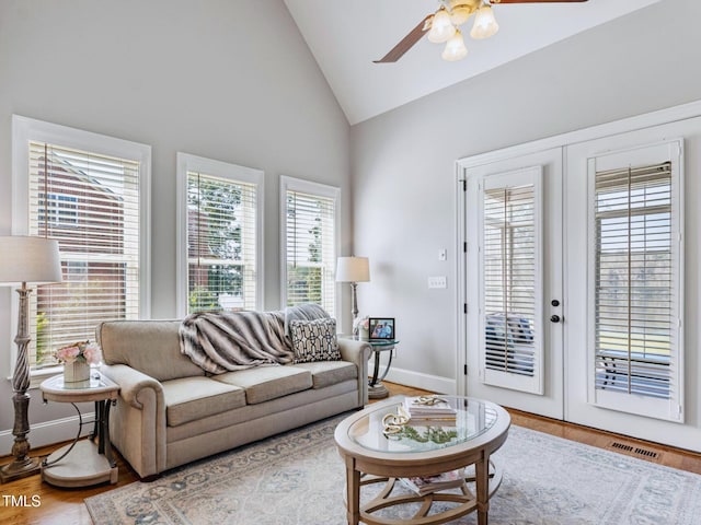 309 Shoreline Dr, Princeton, NC 27569 - living area featuring wood finished floors, baseboards, visible vents, ceiling fan, and french doors