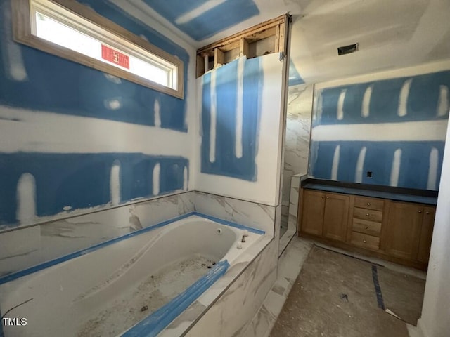 full bath featuring a shower, a garden tub, and vanity