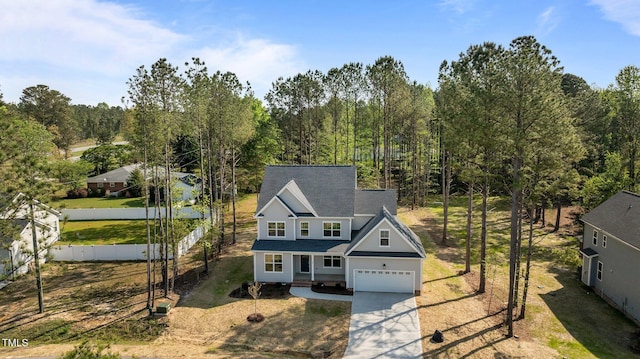 25 Arbor Dr, Youngsville, NC 27596 - view of front of property with concrete driveway and fence