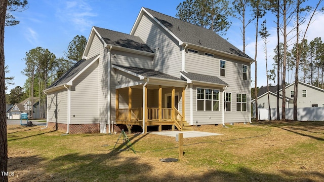 25 Arbor Dr, Youngsville, NC 27596 - rear view of property featuring crawl space, fence, and a lawn