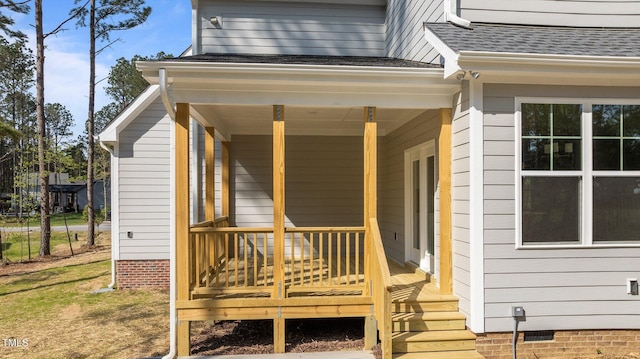 25 Arbor Dr, Youngsville, NC 27596 - view of exterior entry featuring roof with shingles, crawl space, and a deck