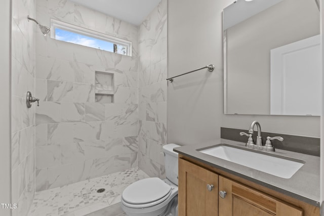 25 Arbor Dr, Youngsville, NC 27596 - full bathroom featuring toilet, tiled shower, and vanity