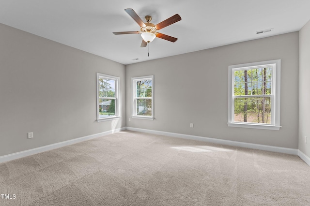 25 Arbor Dr, Youngsville, NC 27596 - carpeted empty room with visible vents, baseboards, and a ceiling fan