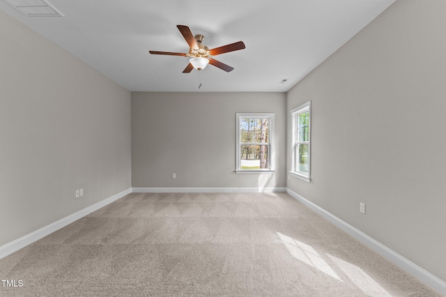 25 Arbor Dr, Youngsville, NC 27596 - empty room featuring light carpet, visible vents, baseboards, and ceiling fan