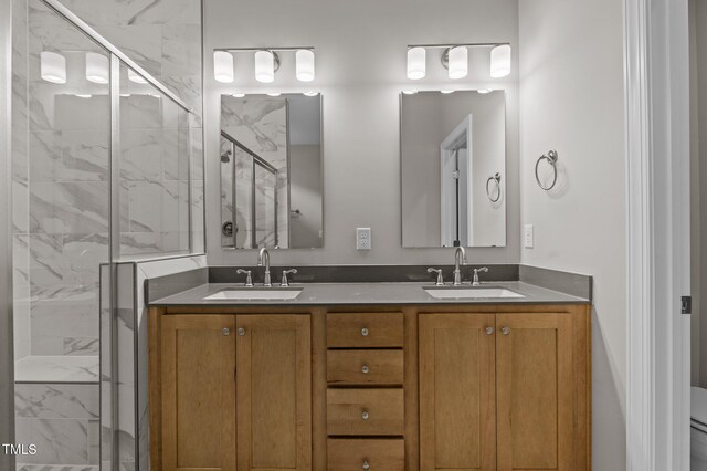 25 Arbor Dr, Youngsville, NC 27596 - bathroom featuring toilet, double vanity, a sink, and a marble finish shower