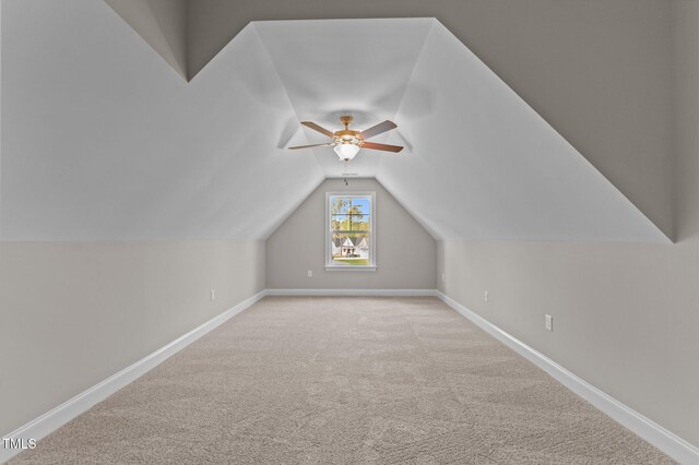 25 Arbor Dr, Youngsville, NC 27596 - bonus room featuring ceiling fan, baseboards, carpet flooring, and vaulted ceiling