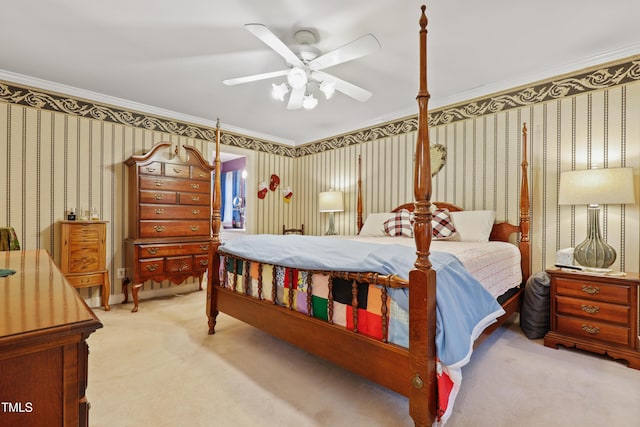 bedroom featuring wallpapered walls, a ceiling fan, carpet floors, and ornamental molding