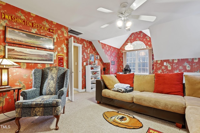 living area with carpet, baseboards, visible vents, wallpapered walls, and ceiling fan