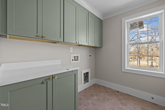 clothes washing area featuring cabinet space, hookup for an electric dryer, washer hookup, and plenty of natural light