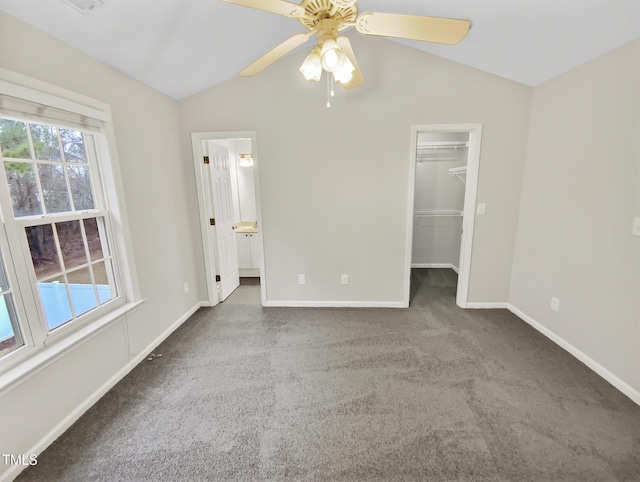 117 Woodson Dr, Clayton, NC 27527 - unfurnished bedroom featuring baseboards, ceiling fan, carpet, a spacious closet, and vaulted ceiling