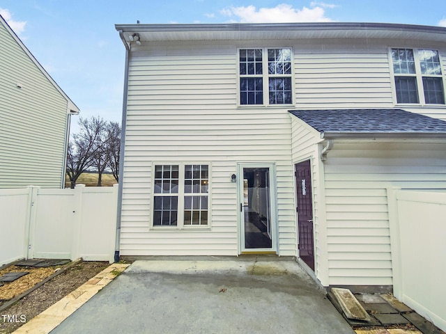 117 Woodson Dr, Clayton, NC 27527 - exterior space featuring roof with shingles, a patio area, fence, and a gate