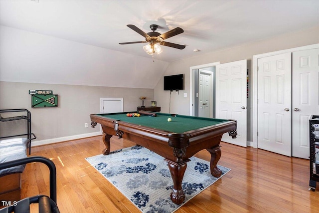 game room featuring ceiling fan, lofted ceiling, pool table, baseboards, and light wood-style floors