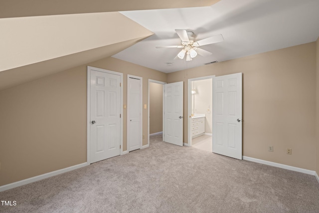 bonus room featuring visible vents, baseboards, ceiling fan, lofted ceiling, and carpet floors