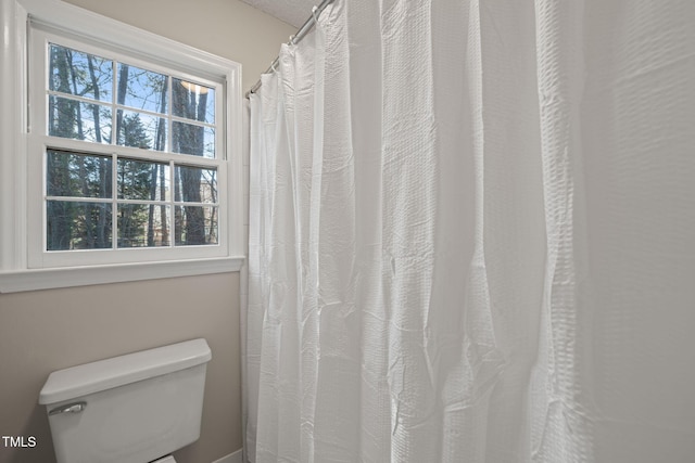 bathroom featuring toilet