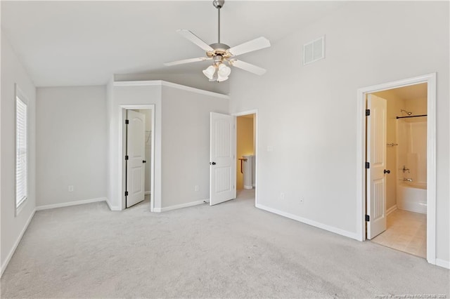 unfurnished bedroom with carpet, visible vents, and baseboards