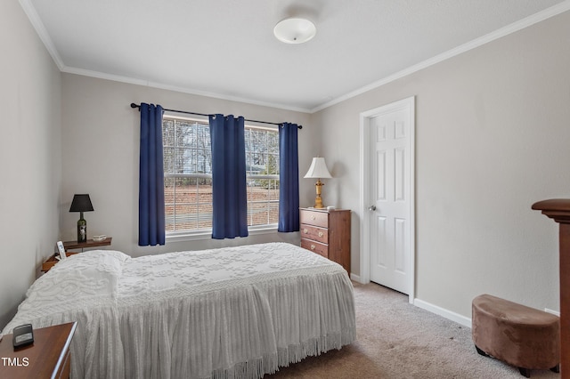 bedroom featuring crown molding, carpet, and baseboards