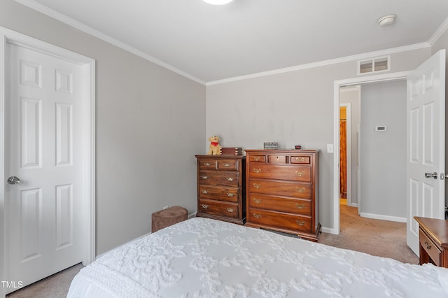 carpeted bedroom with baseboards, visible vents, and crown molding