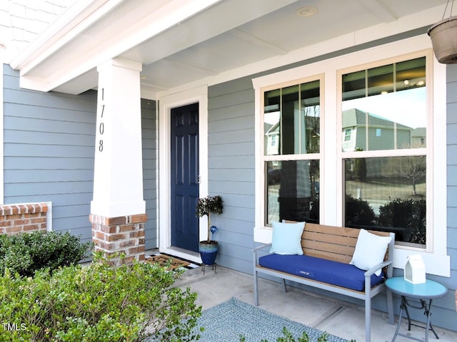 doorway to property with a porch