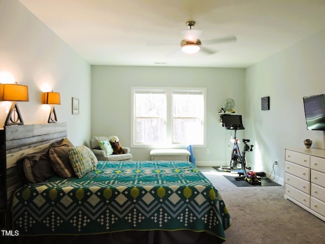 carpeted bedroom featuring baseboards