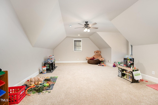 recreation room with baseboards, carpet floors, a ceiling fan, and vaulted ceiling