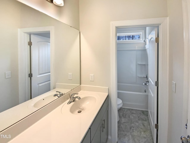 full bath featuring toilet, shower / washtub combination, and vanity