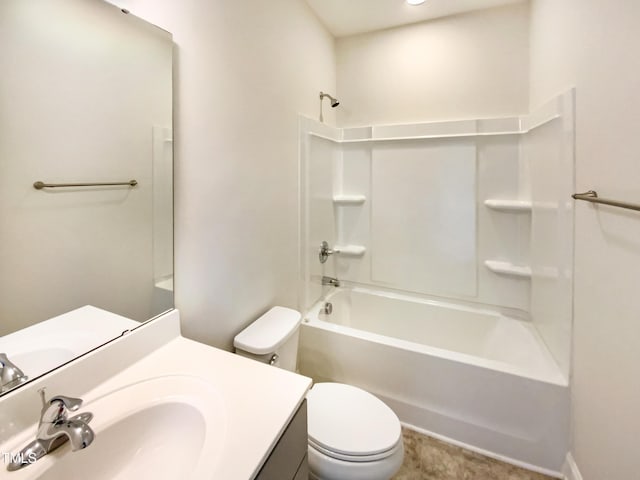 bathroom with shower / tub combination, vanity, and toilet