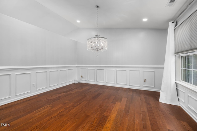 unfurnished dining area with a chandelier, recessed lighting, visible vents, vaulted ceiling, and dark wood finished floors