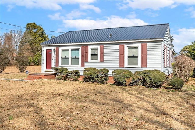 view of front of house featuring metal roof